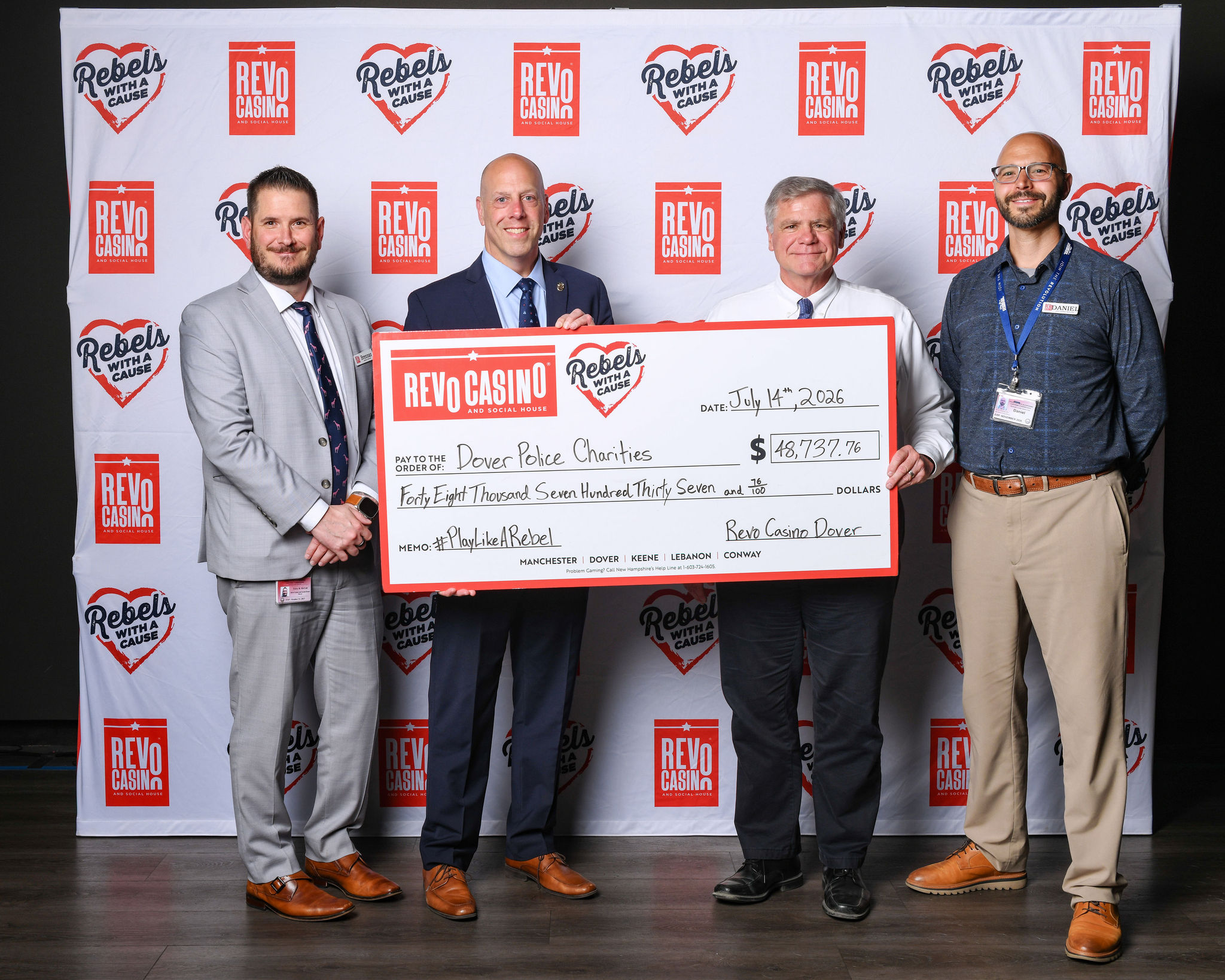 Pictured left to right: Brennan McCall, General Manager Revo Casino, Chief David Terlemezian, President Dover Police Charities, William Simons, Treasurer Dover Police Charities, and Daniel Katsekas, Assistant General Manager Revo Casino